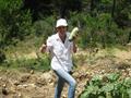 Our happy VR owner harvesting a delicious zucchini